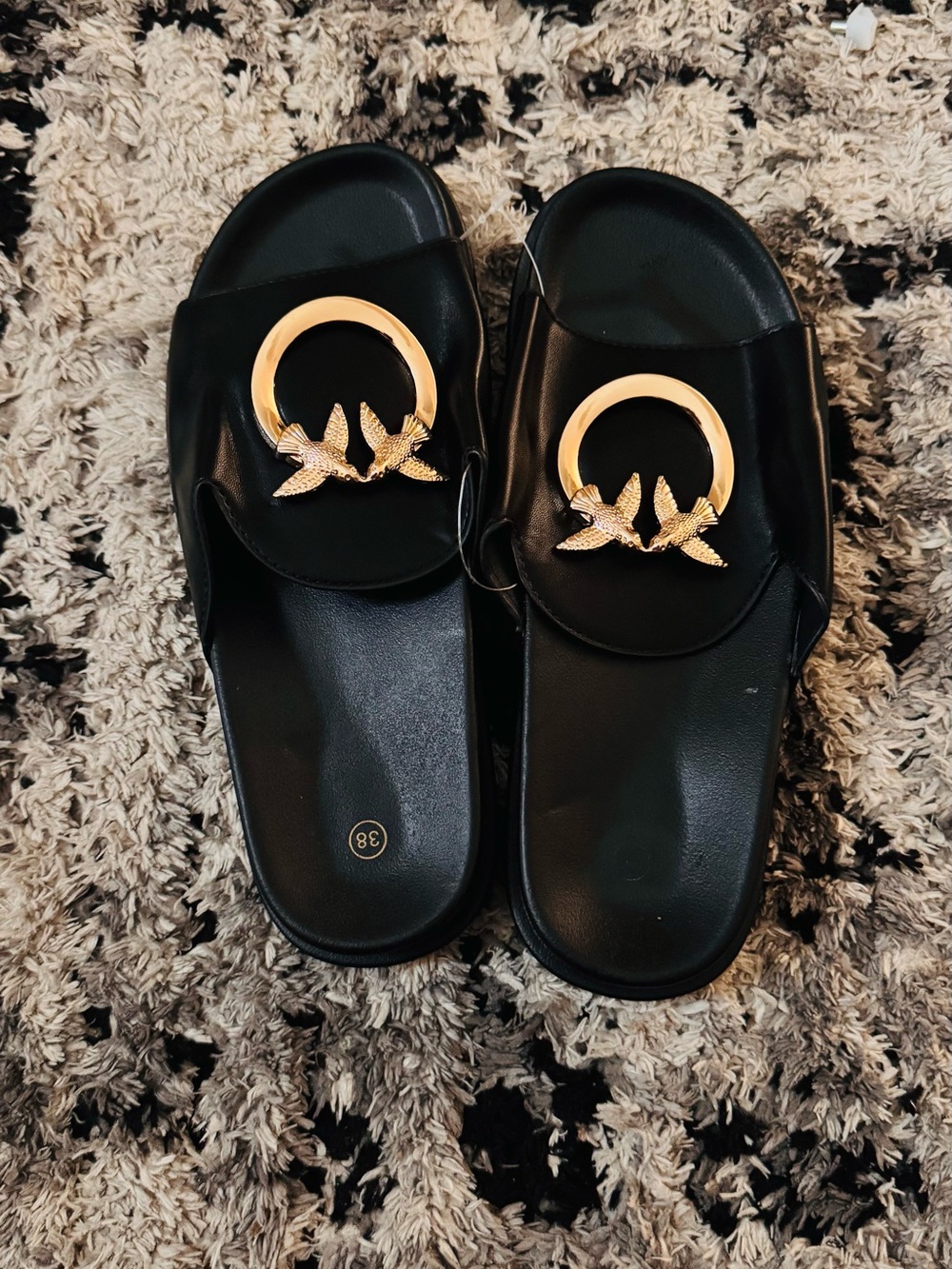 Black Slide Mules with Gold Bird Emblem
